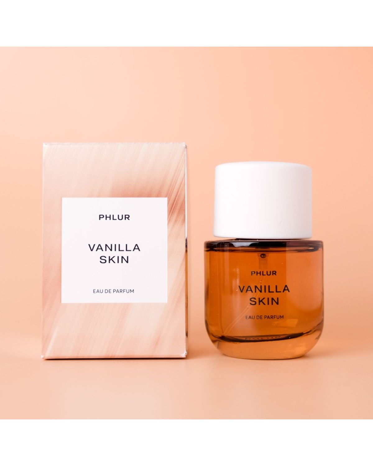 Phlur Vanilla Skin Eau de Parfum 50ml bottle with retail box #size_retail-bottle-50ml-1-7-fl-oz